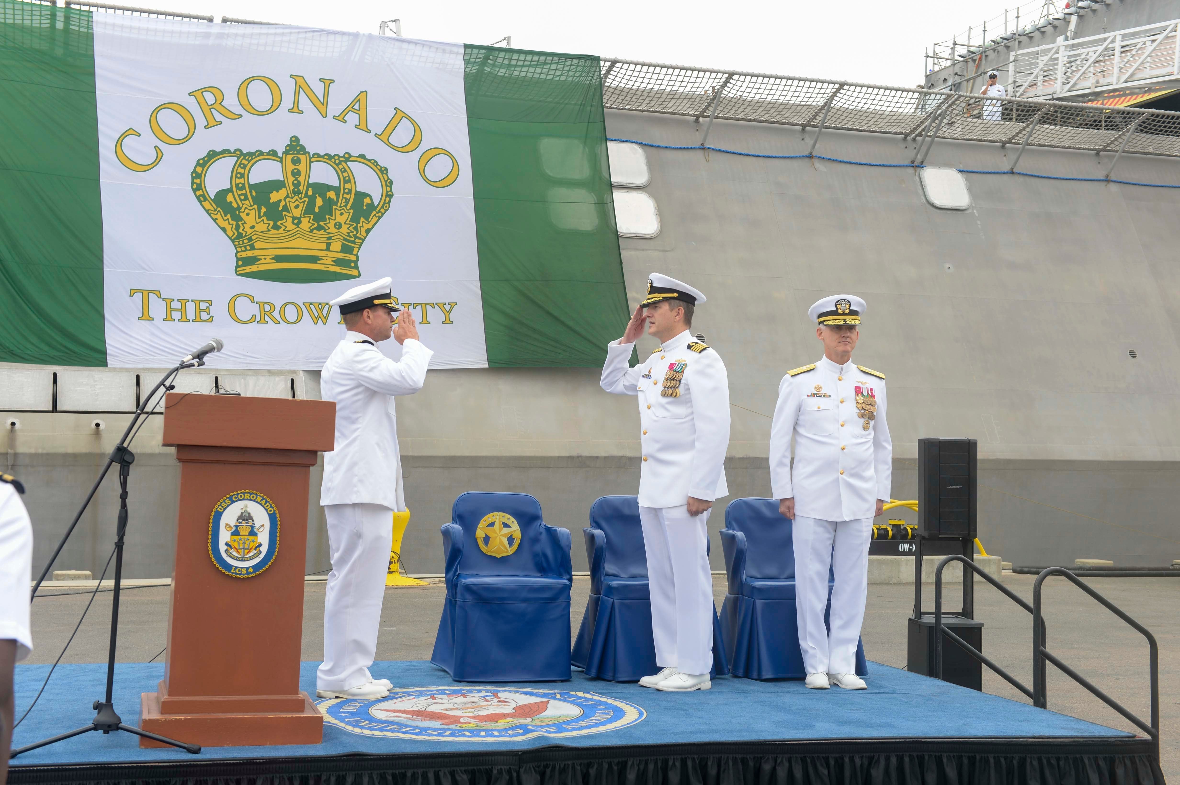 Capt. Marc Crawford, center, commodore of Littoral Combat Ship Squadron ONE, gives the order to decommission Independence-variant littoral combat ship USS Coronado (LCS-4) during a decommissioning ceremony, Sept. 14. US Navy Photo.jpg